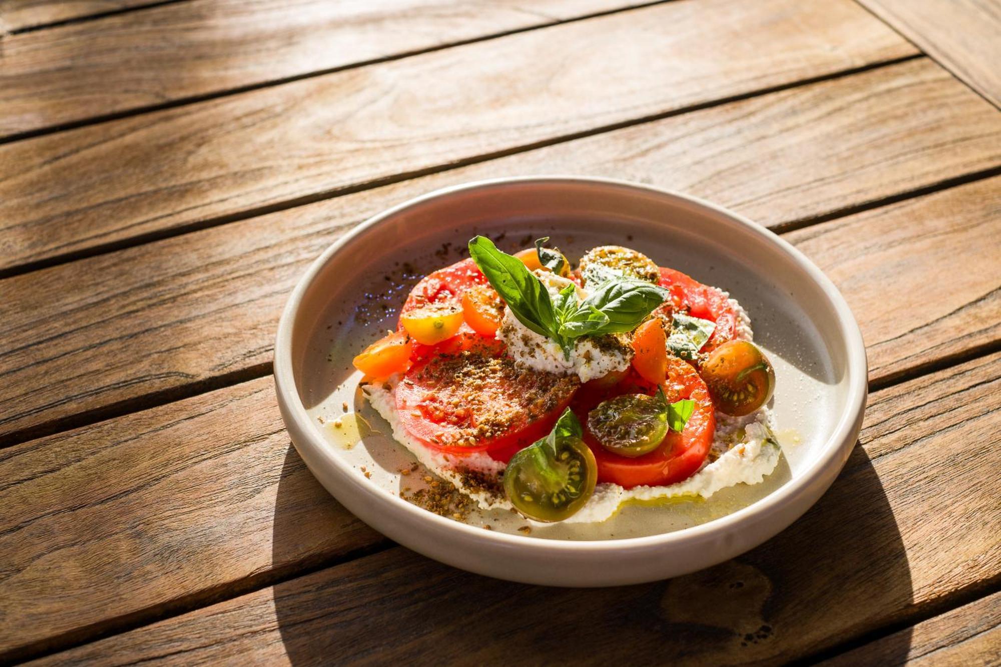 Carnmore Chateau Marlborough Blenheim Exterior photo A salad of tomatoes, feta cheese, and olive oil